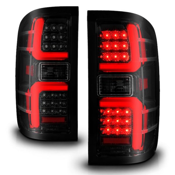 ANZO 311451 Tail Light Assembly; Smoke Lens; Black Housing; LED Bulb; Red Brake Light/ Sequential Turn Signal Light/ Running Light/ White Reverse Light With Initiation Feature; Set Of 2
